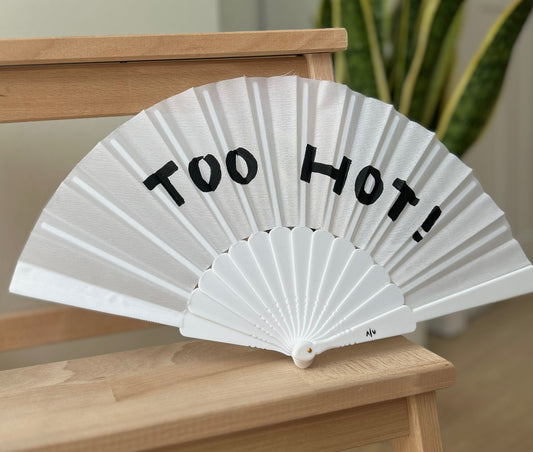 White hand fan - “TOO HOT!”