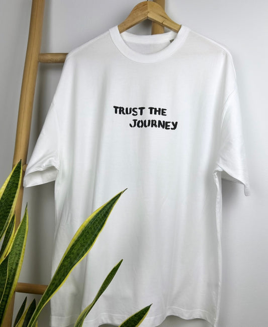 White oversized unisex handpainted T-shirt - “Trust the journey”