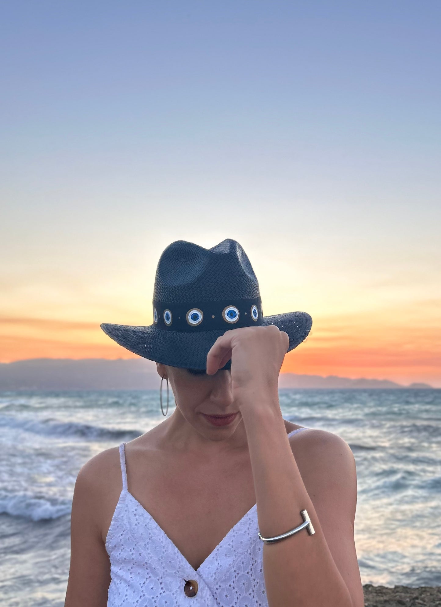 Black handpainted panama hat - “evil eye”