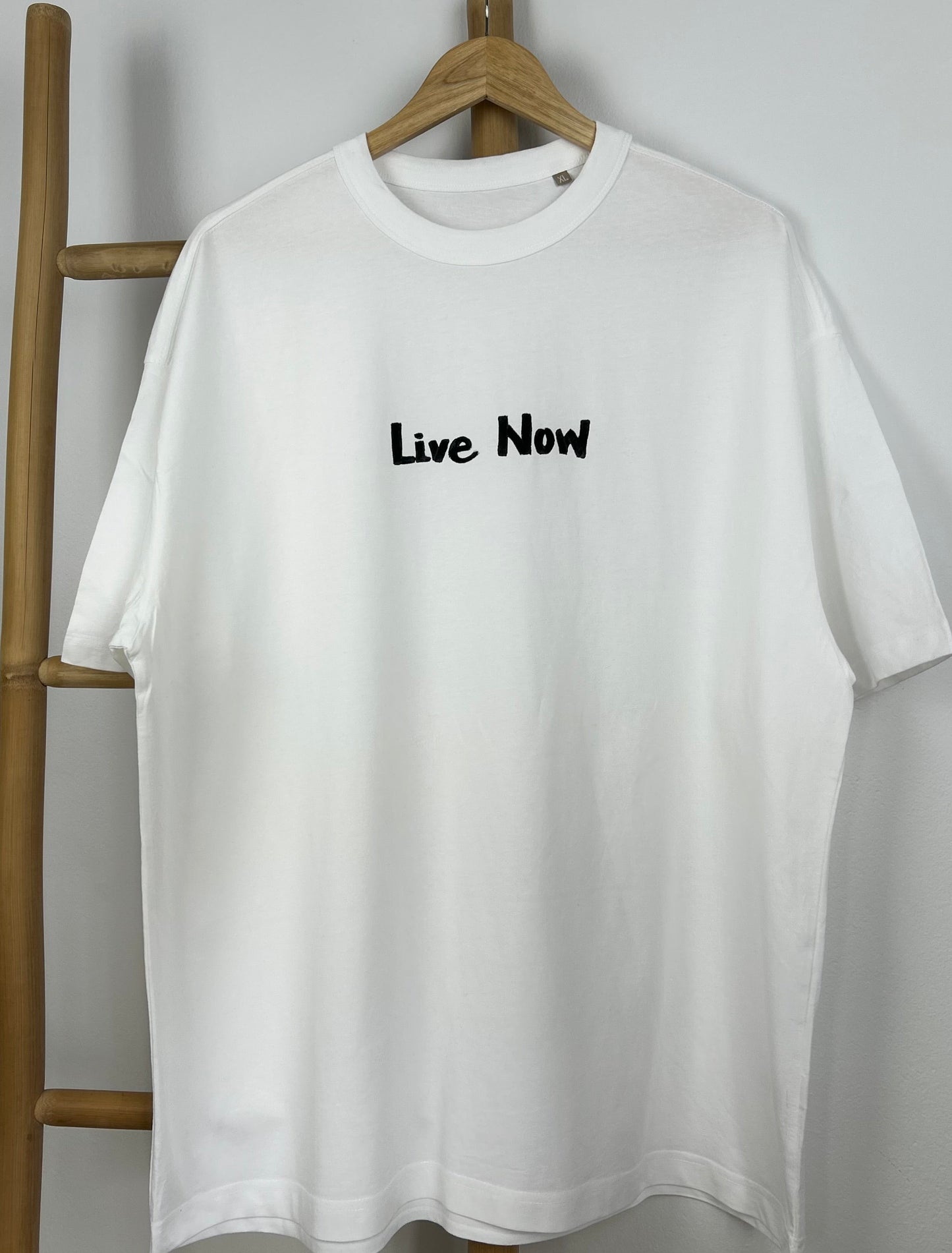 White oversized unisex handpainted T-shirt - “Live now”