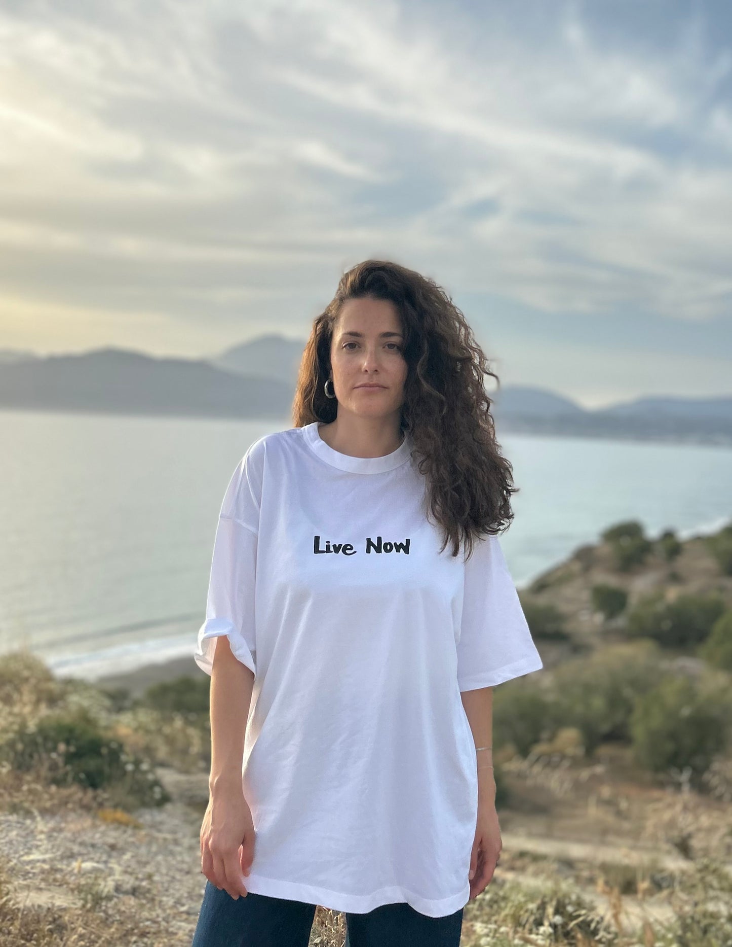 White oversized unisex handpainted T-shirt - “Live now”