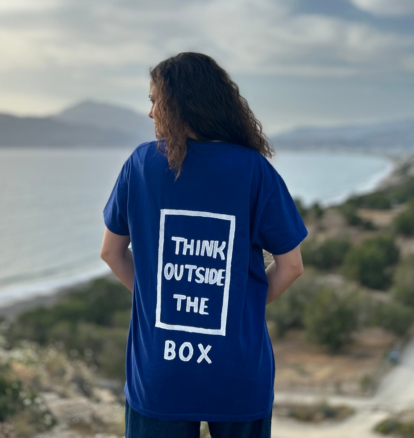 Blue unisex handpainted T-shirt - “Think outside the box”