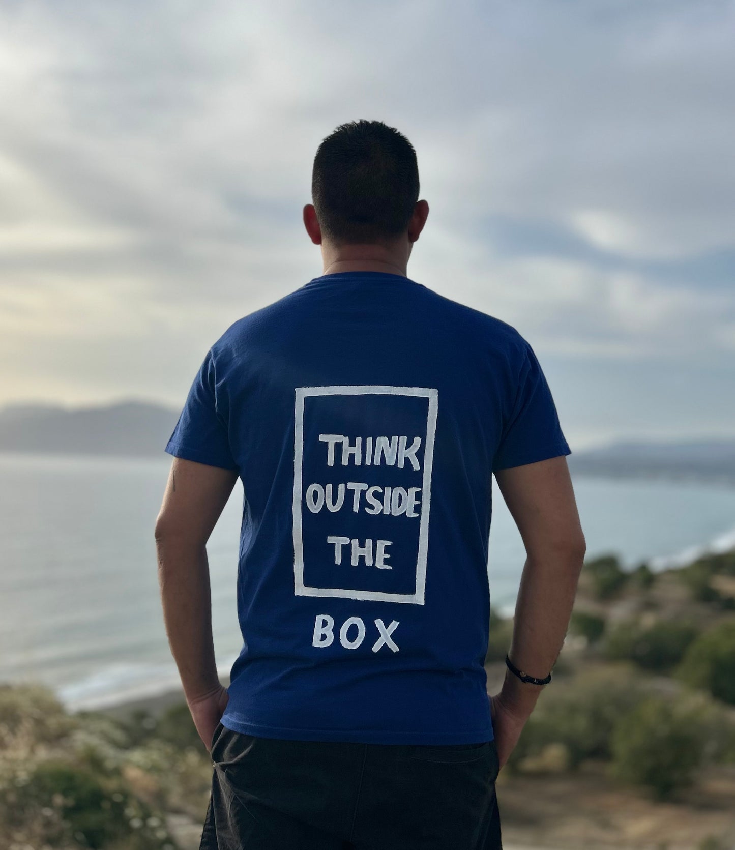 Blue unisex handpainted T-shirt - “Think outside the box”